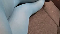 Sissy crossdresser wearing blue opaque tights teasing and cumming on the sofa - Image # 4