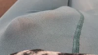 Sissy crossdresser wearing blue opaque tights teasing and cumming on the sofa - Image # 10